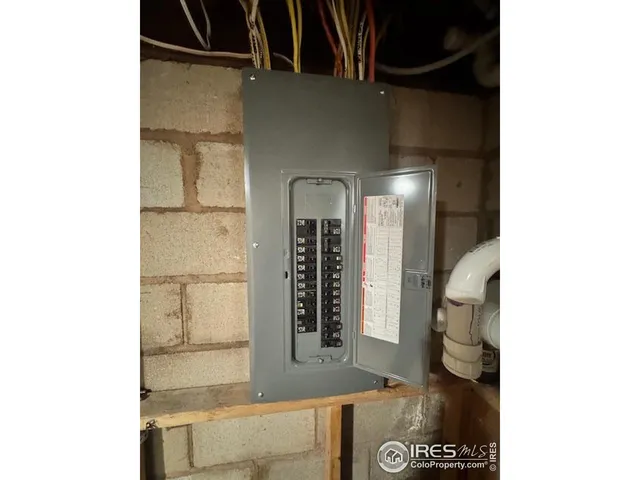 a bathroom with a sink toilet and mirror