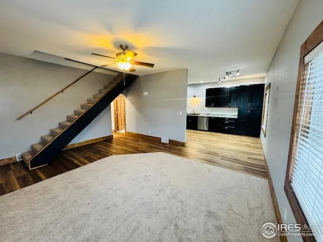a view of entryway and kitchen