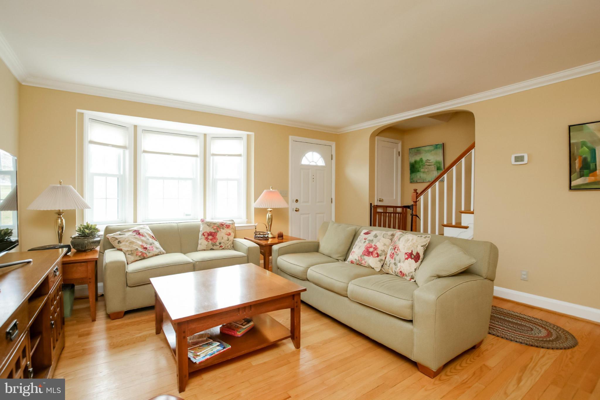 181 Dumbarton Road Baltimore, MD 21212 - Photo 11 of 30 a living room with furniture and a large window