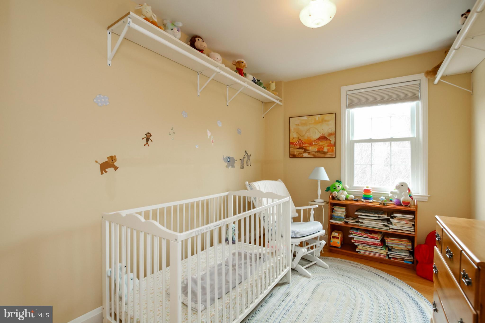 181 Dumbarton Road Baltimore, MD 21212 - Photo 22 of 30 a bedroom with furniture and a window