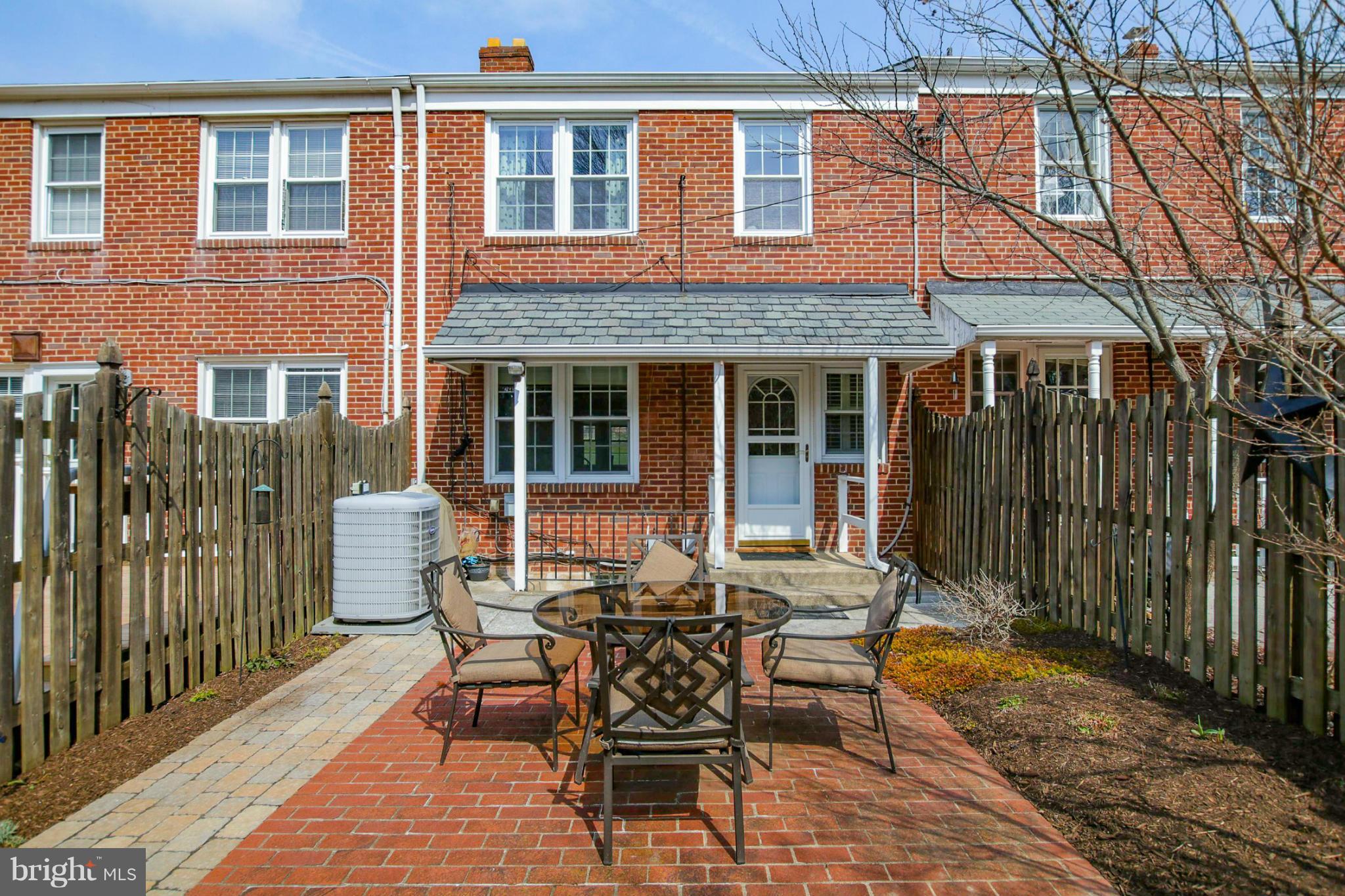 181 Dumbarton Road Baltimore, MD 21212 - Photo 28 of 30 a patio with table and chairs