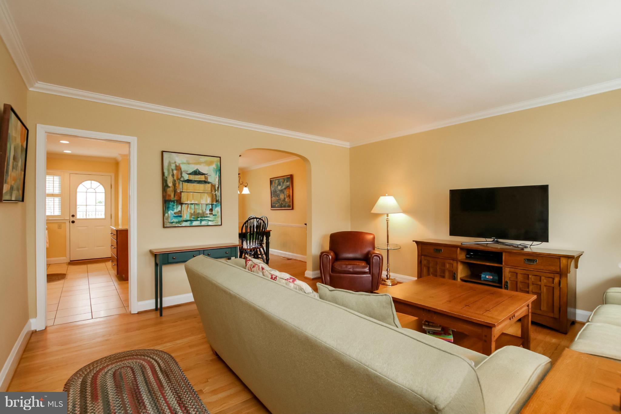 181 Dumbarton Road Baltimore, MD 21212 - Photo 10 of 30 a living room with furniture and a flat screen tv