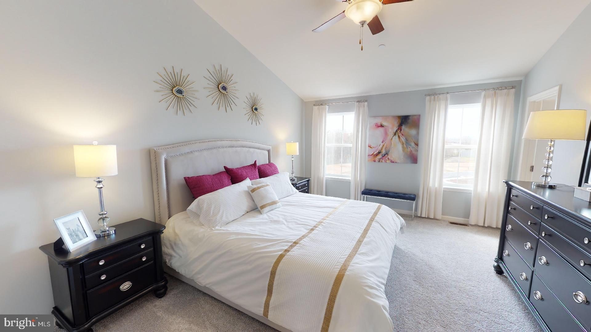 306 Purple Place Edgewood, MD 21040 - Photo 17 of 46 a bedroom with a bed and a chandelier