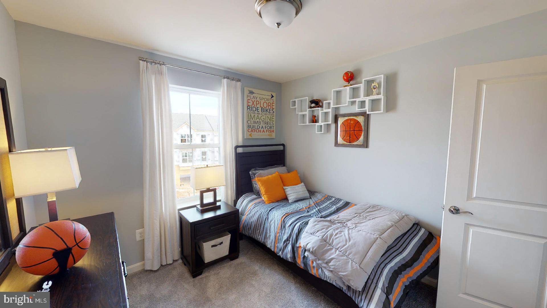 306 Purple Place Edgewood, MD 21040 - Photo 28 of 46 a bedroom with a bed and a window