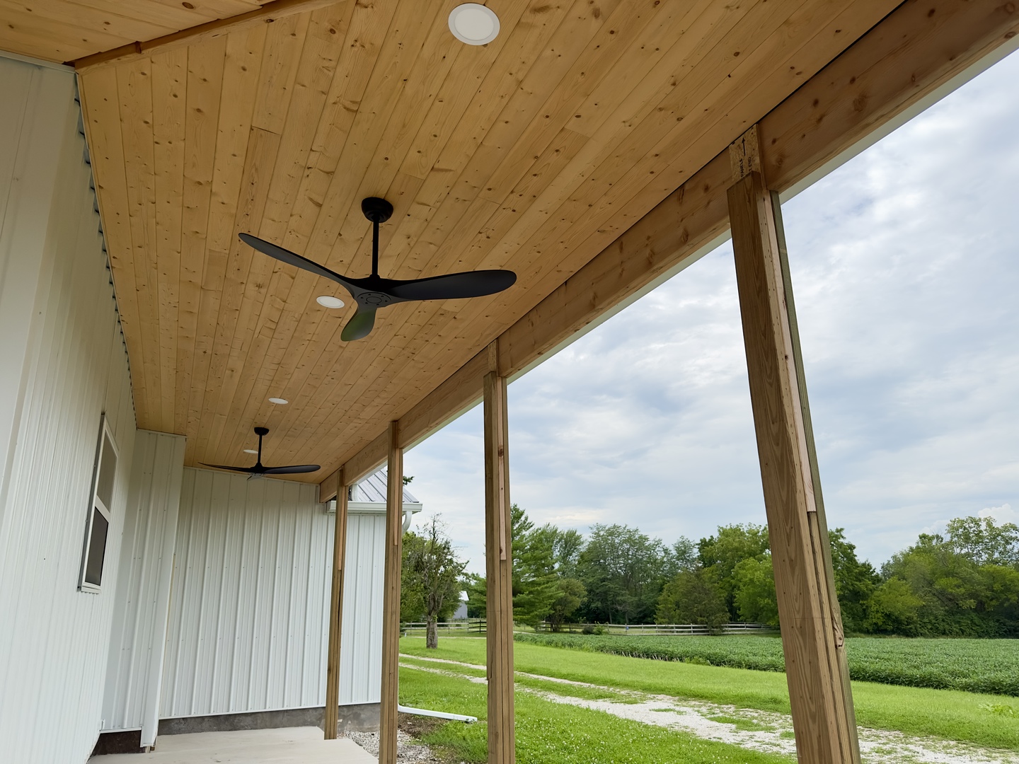 2452 East 350th Road Oglesby, IL 61348 - Photo 3 of 27 a view of a porch with a floor to ceiling window and a yard