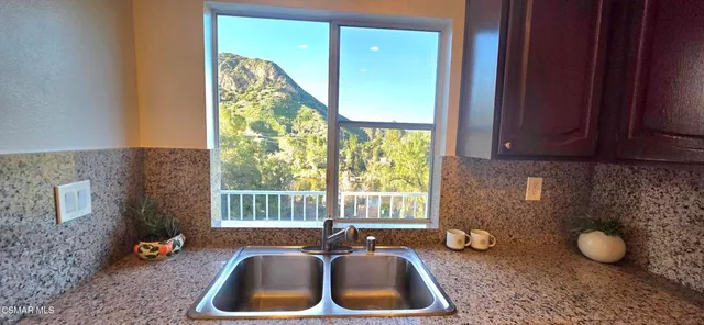 a room with furniture and a window