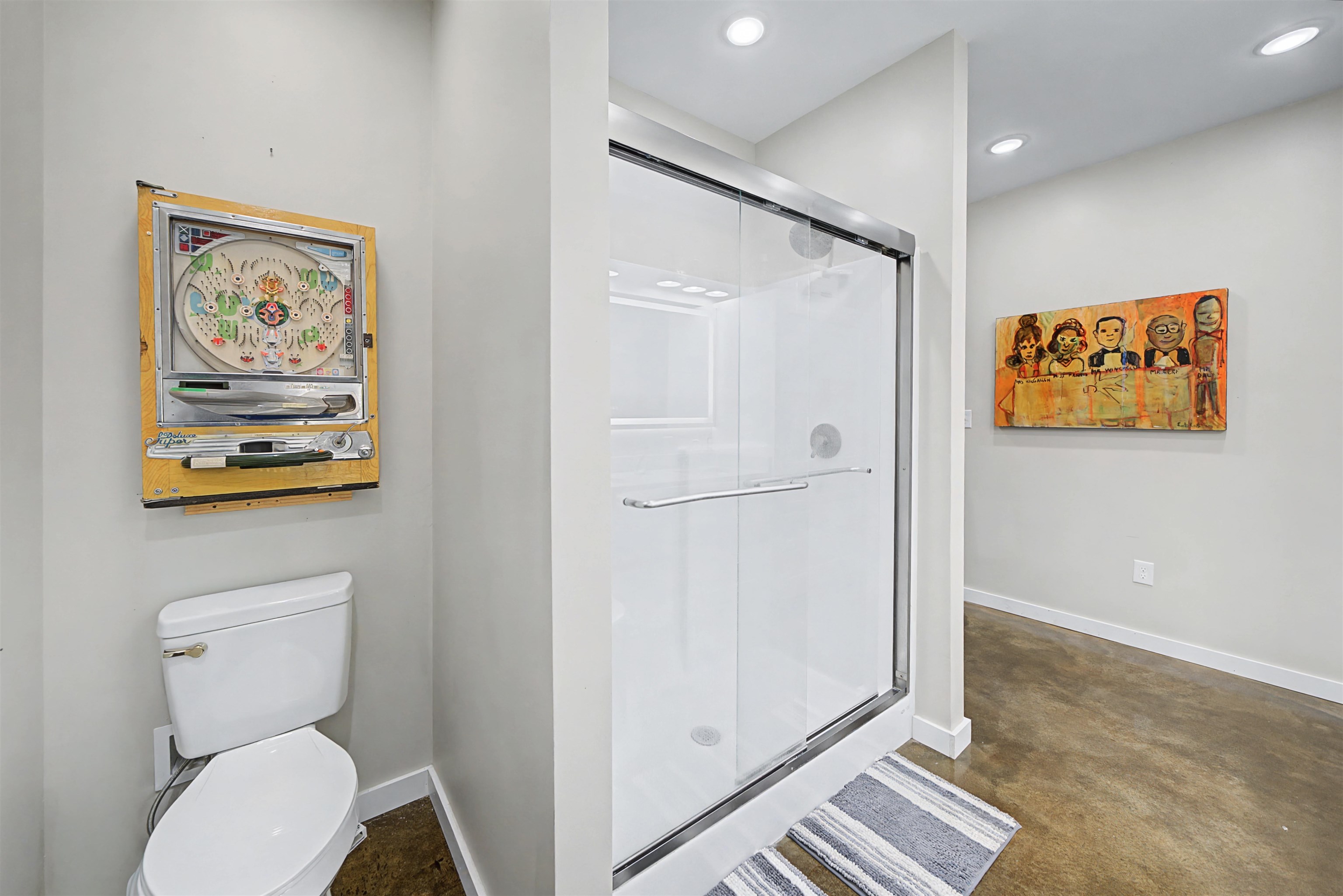 5439 Hines Gin Road Selmer, TN 38375 - Photo 17 of 33 a white toilet sitting next to a bathroom sink