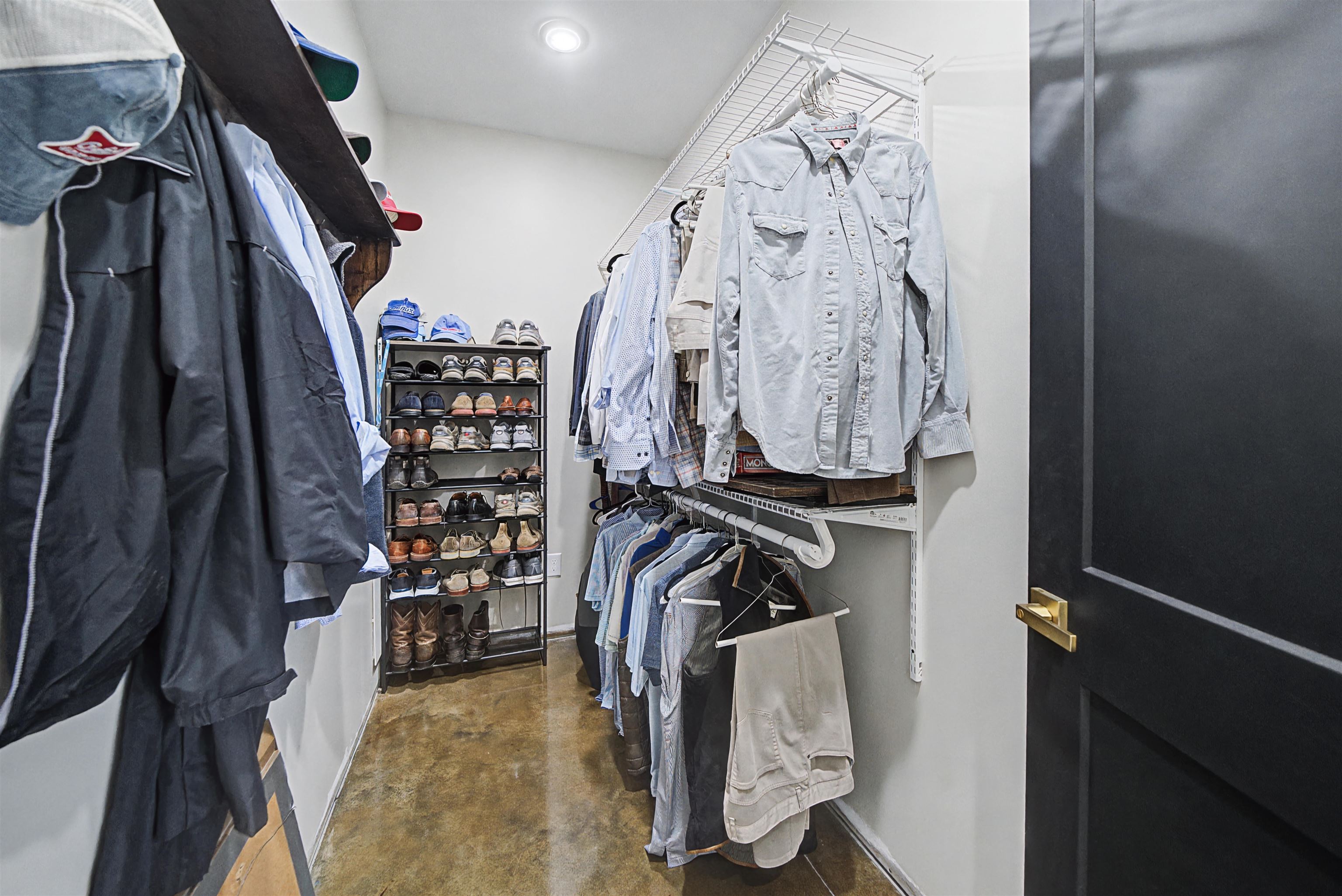 5439 Hines Gin Road Selmer, TN 38375 - Photo 19 of 33 a view of walk in closet with clothes