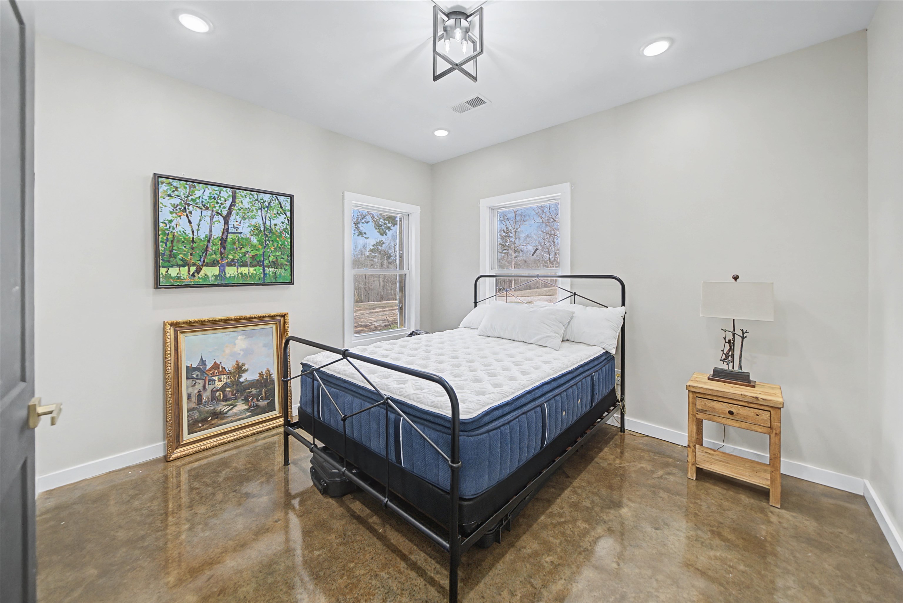 5439 Hines Gin Road Selmer, TN 38375 - Photo 20 of 33 a bedroom with a bed and a table in it