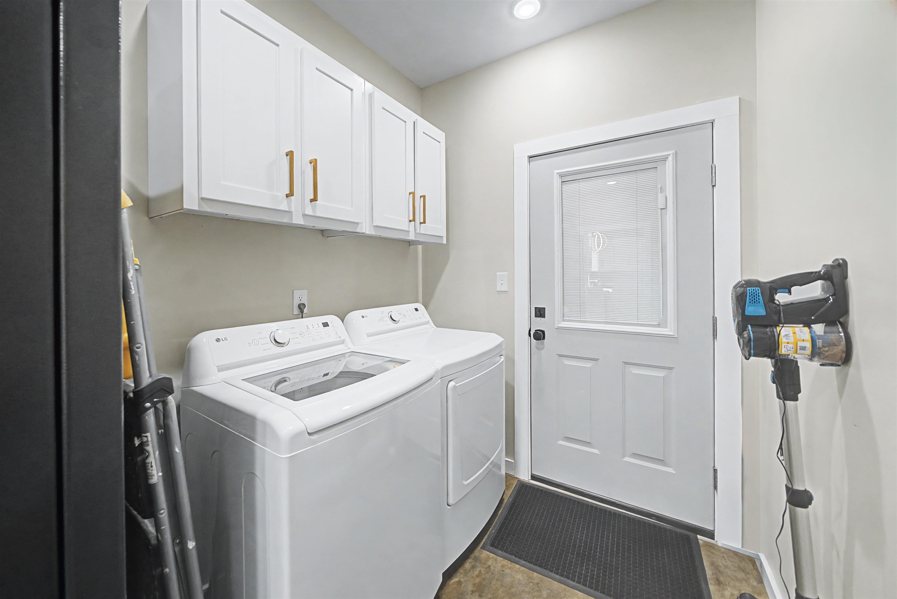 5439 Hines Gin Road Selmer, TN 38375 - Photo 23 of 33 a utility room with dryer and washer