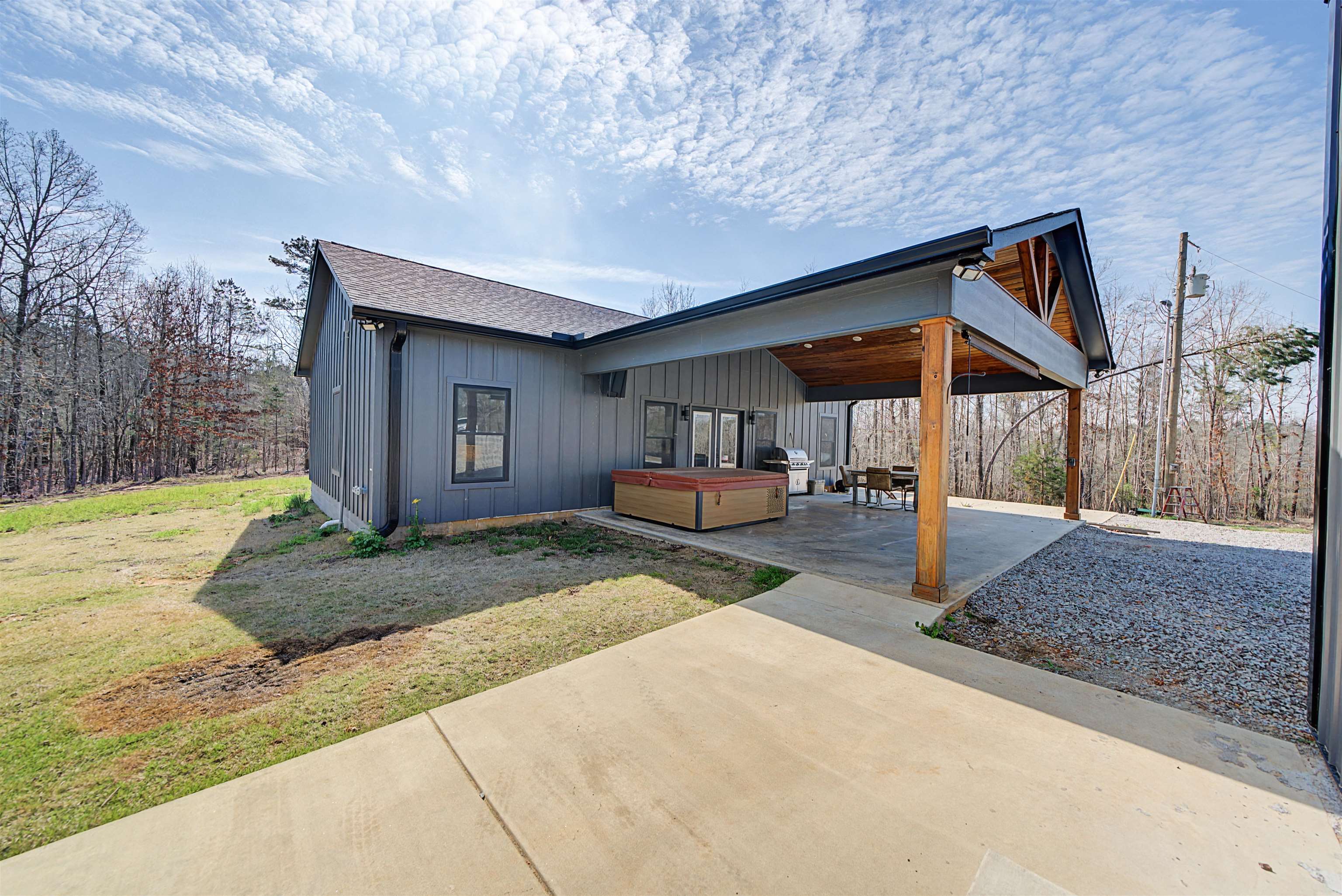 5439 Hines Gin Road Selmer, TN 38375 - Photo 6 of 33 a front view of a house with garden