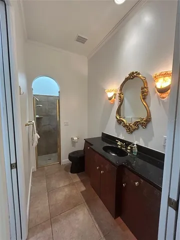 a bathroom with a sink and mirror