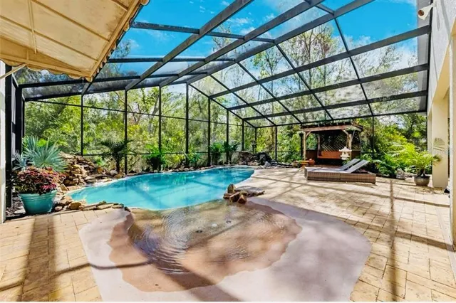 a view of a garden with a patio