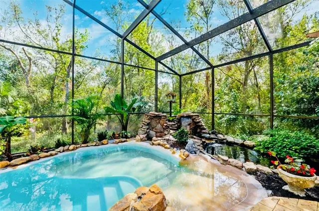 a view of yard with patio