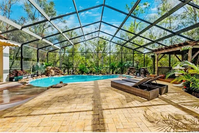 a view of a yard with chairs