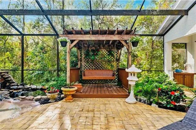 a view of a pathway with plants