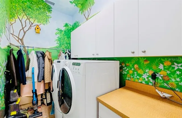 an aerial view of house with yard