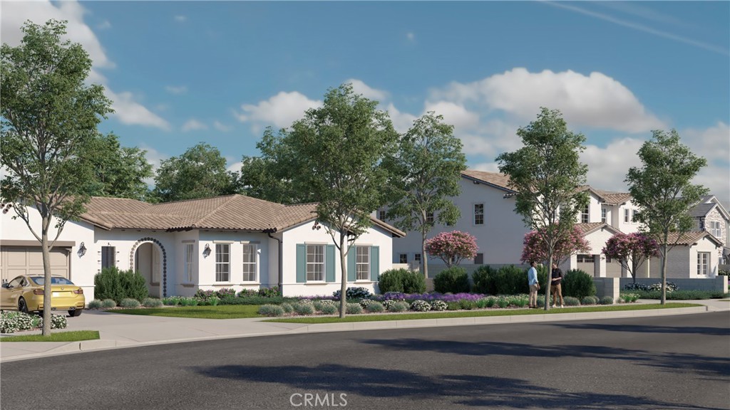 6525 Etiwanda Avenue Rancho Cucamonga, CA 91739 - Photo 7 of 9 a front view of a house with a yard