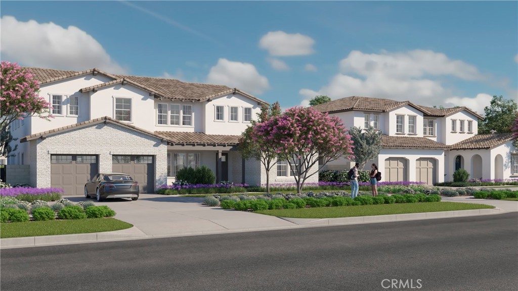 6525 Etiwanda Avenue Rancho Cucamonga, CA 91739 - Photo 9 of 9 a front view of a house with a garden