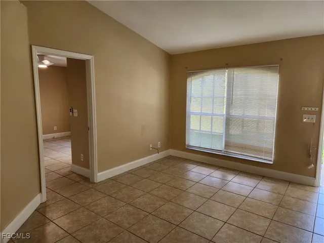 a view of an empty room and window