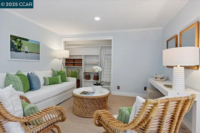 a living room with furniture and a table