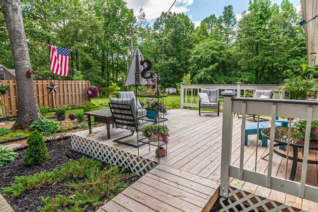a view of a chairs and table in the patio