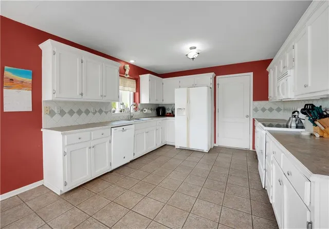 $585,000 | 1287 Southeast State Rte 13, Leeton, MO 64761