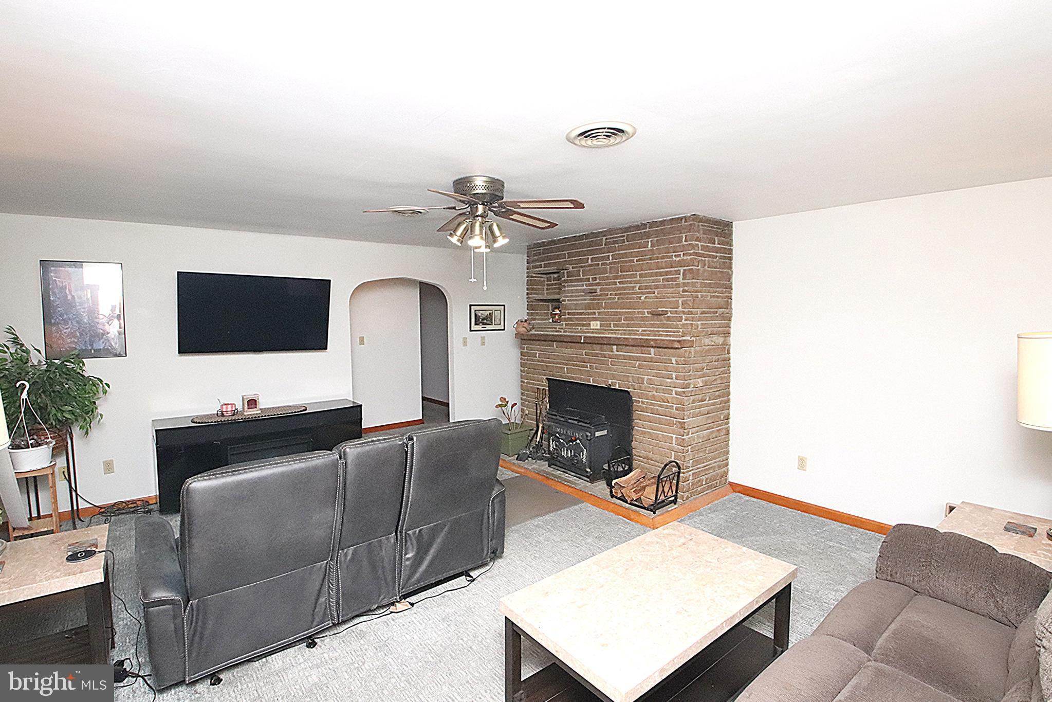 14540 National Pike Clear Spring, MD 21722 - Photo 8 of 37 Living Room with woodstove