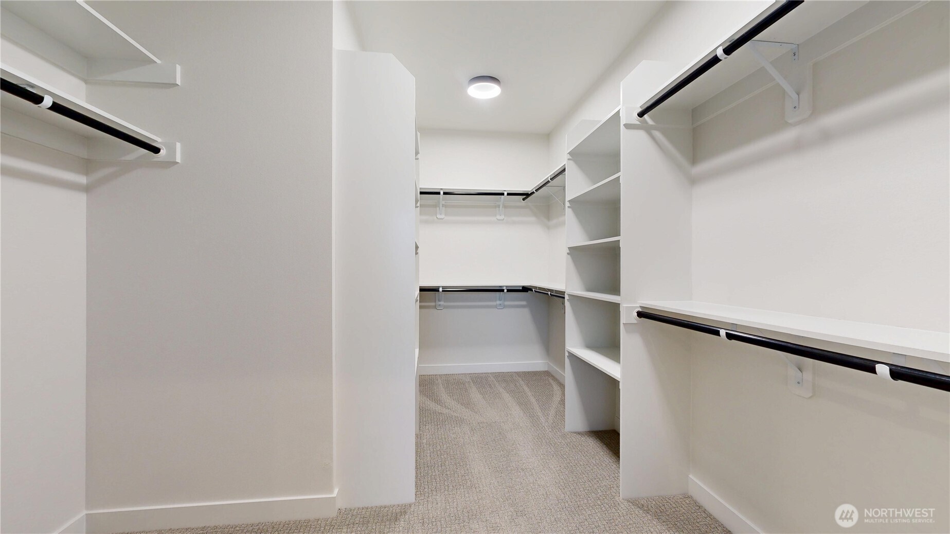 916 Hidden Lane Prosser, WA 99350 - Photo 15 of 24 a view of walk in closet with empty racks
