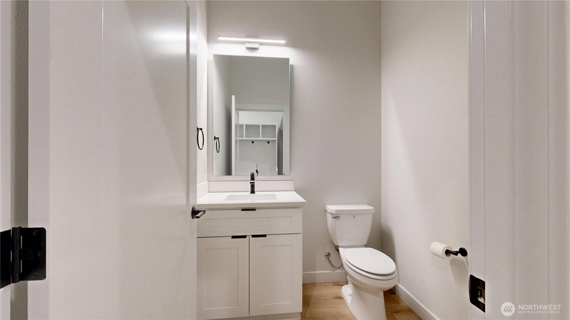 916 Hidden Lane Prosser, WA 99350 - Photo 9 of 24 a bathroom with a toilet sink and mirror