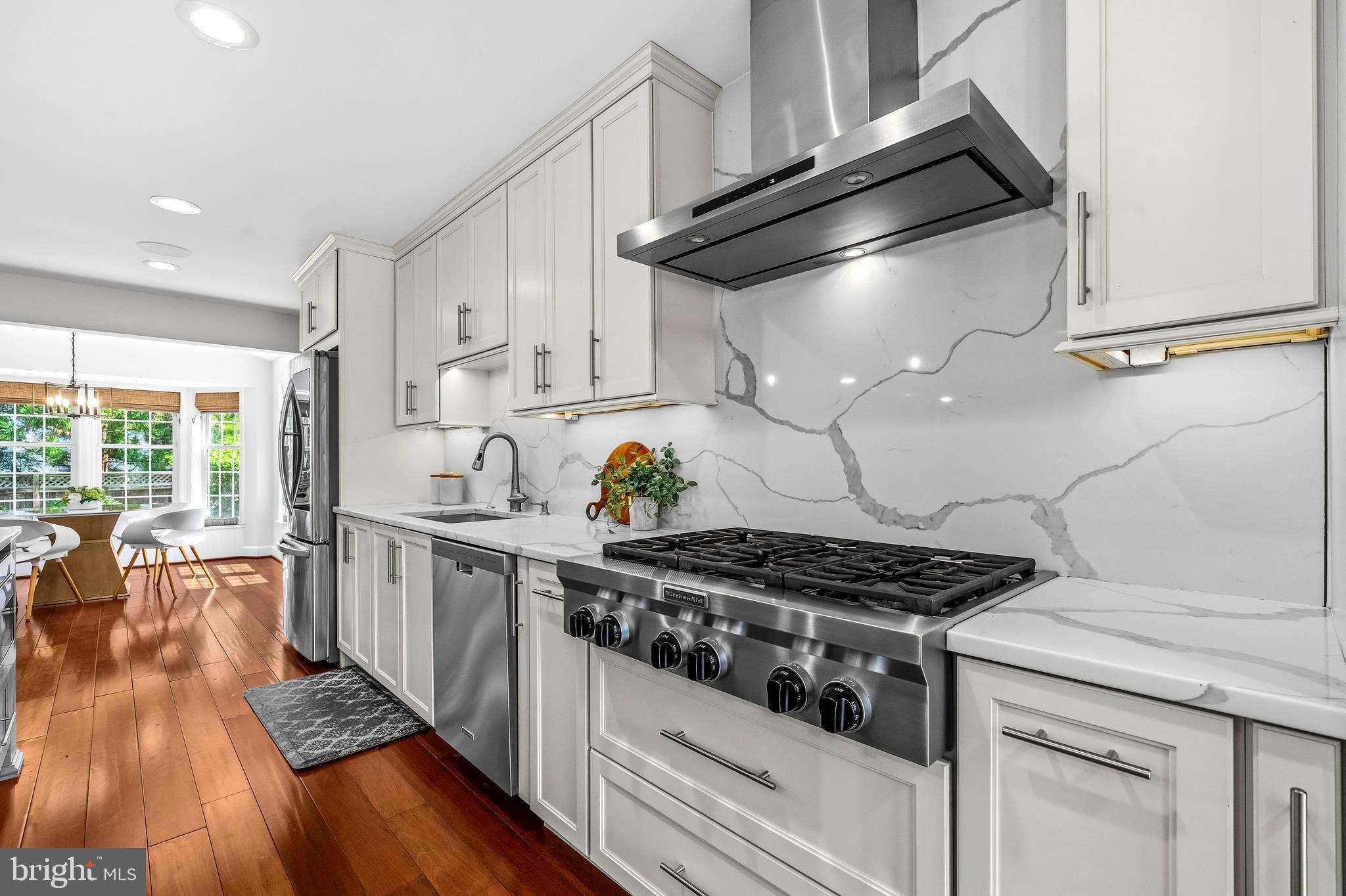 4007 West Braddock Road Alexandria, VA 22304 - Photo 15 of 52 a kitchen with stainless steel appliances granite countertop a stove and a sink