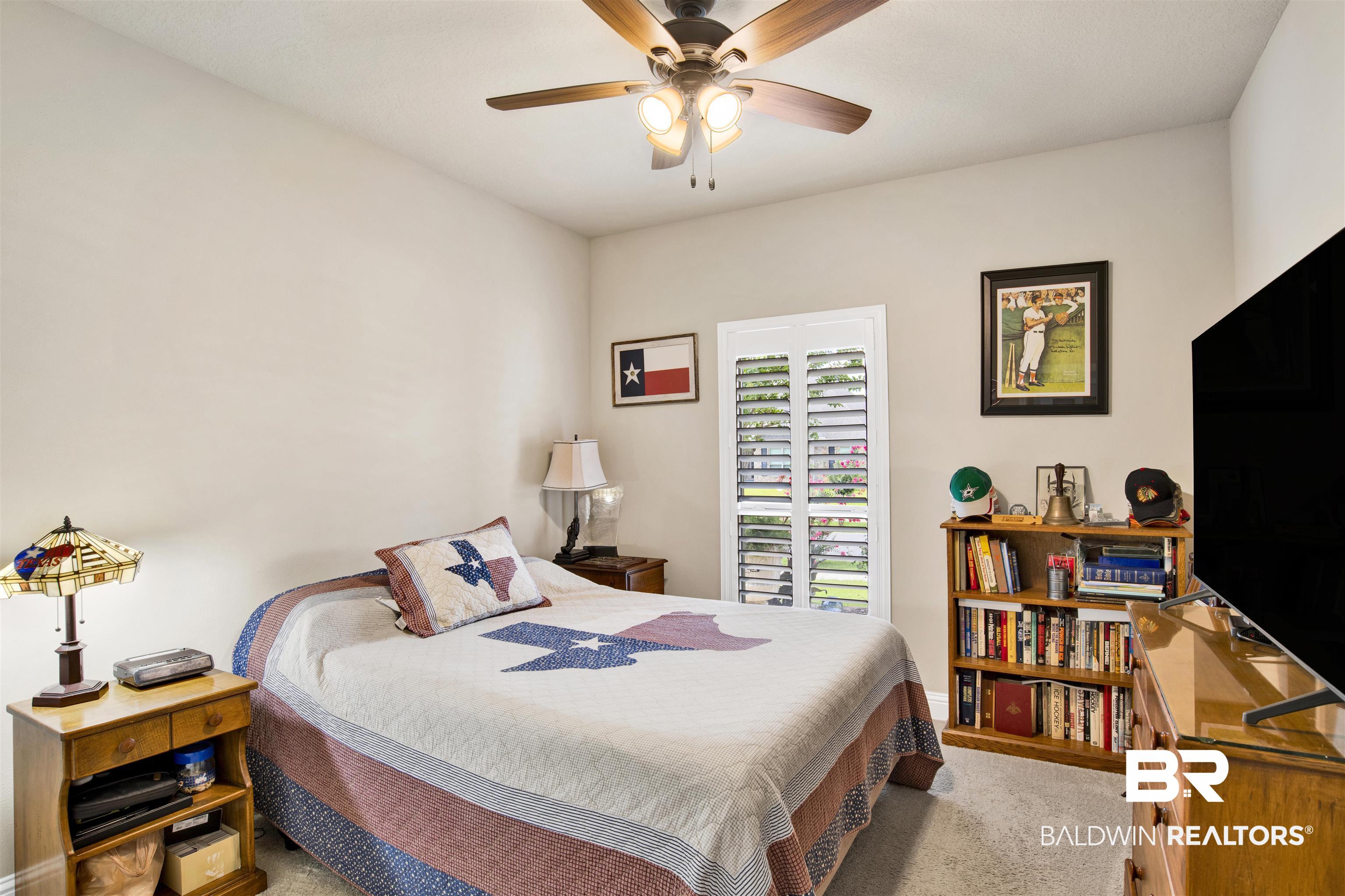 278 Silo Loop Fairhope, AL 36532 - Photo 15 of 26 Carpeted bedroom with ceiling fan and baseboards