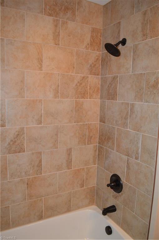 3389 Nottingham Road Winston-Salem, NC 27104 - Photo 13 of 24 Tiled shower in guest bath