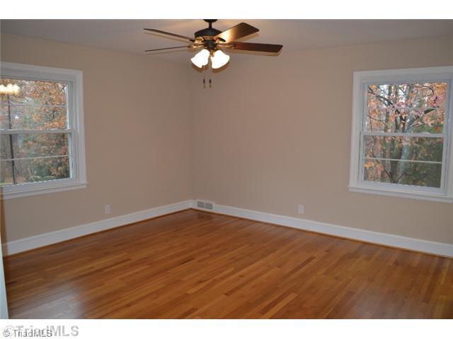 3389 Nottingham Road Winston-Salem, NC 27104 - Photo 15 of 24 Master Bedroom. Master bedroom with his and hers closets