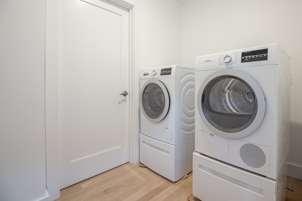 55 East Springfield Street, Unit 4 Boston, MA 02118 - Photo 7 of 7 a utility room with dryer and washer