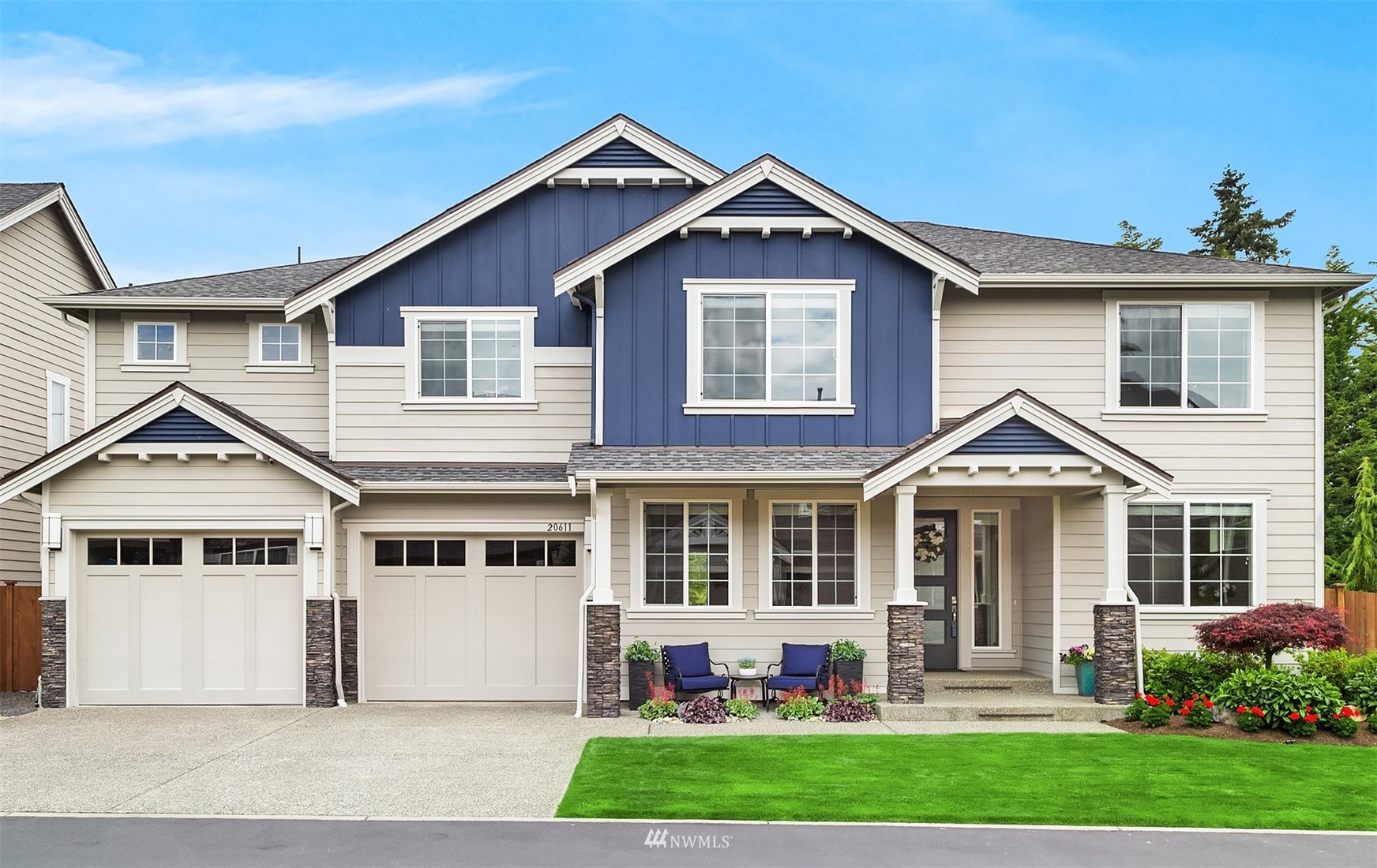 20611 37th Avenue Southeast Bothell, WA 98021 - Photo 1 of 40 a front view of a house with garden