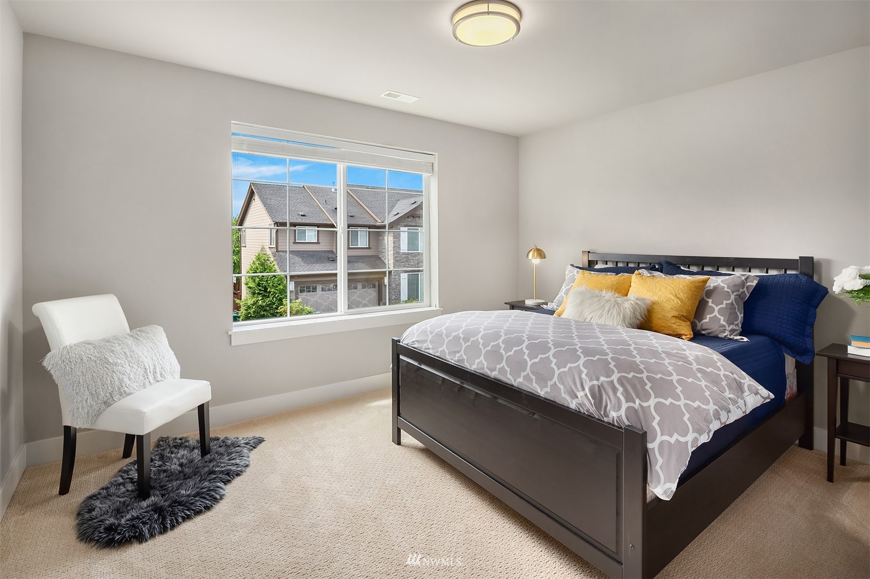 20611 37th Avenue Southeast Bothell, WA 98021 - Photo 20 of 40 a bedroom with a bed chair and window