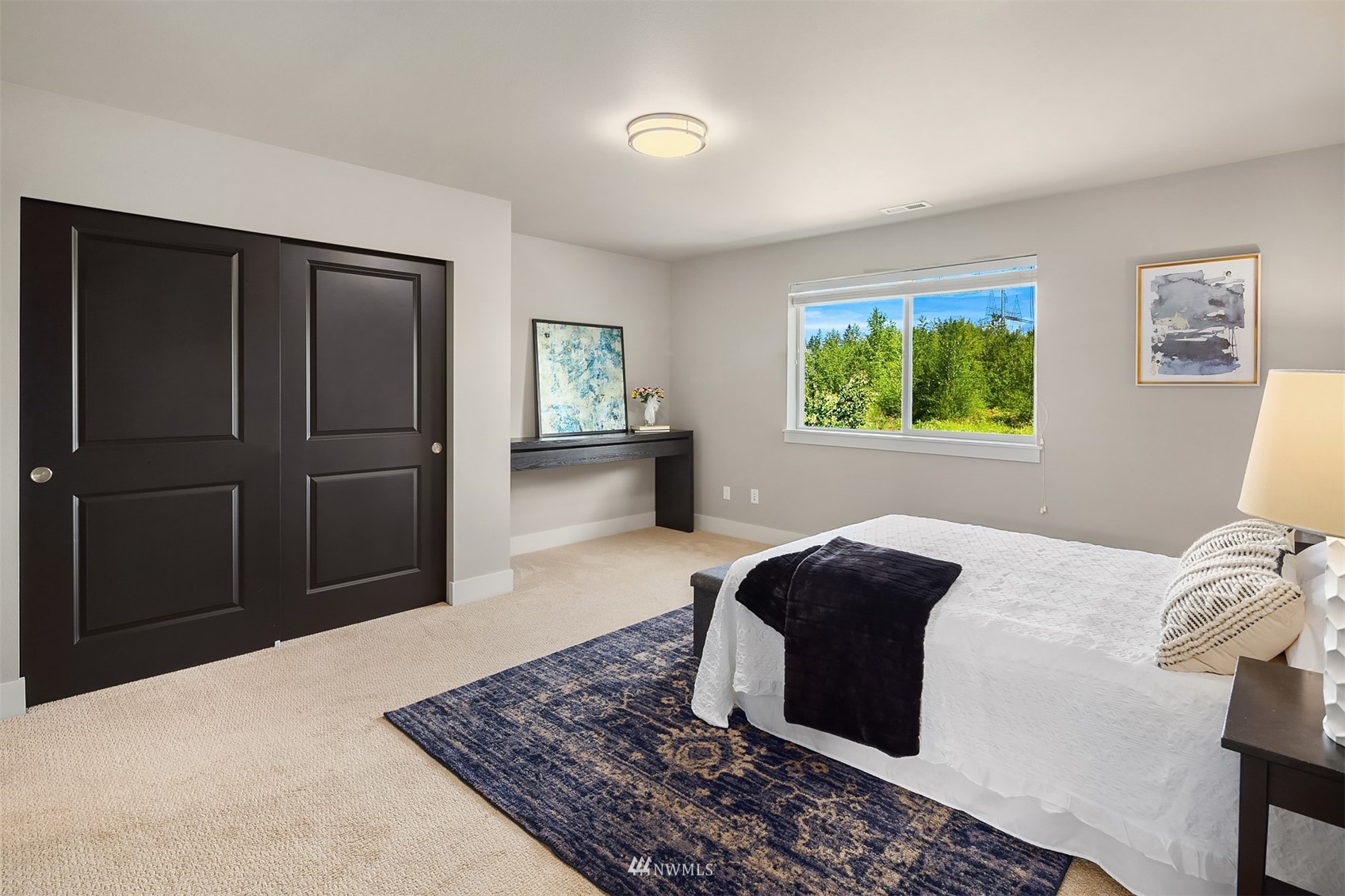20611 37th Avenue Southeast Bothell, WA 98021 - Photo 26 of 40 a bedroom with a bed and a dresser