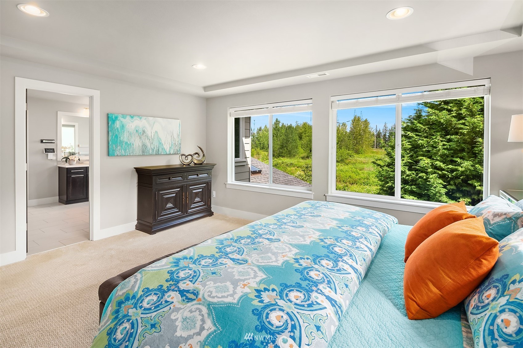 20611 37th Avenue Southeast Bothell, WA 98021 - Photo 30 of 40 a bedroom with a bed and a large window