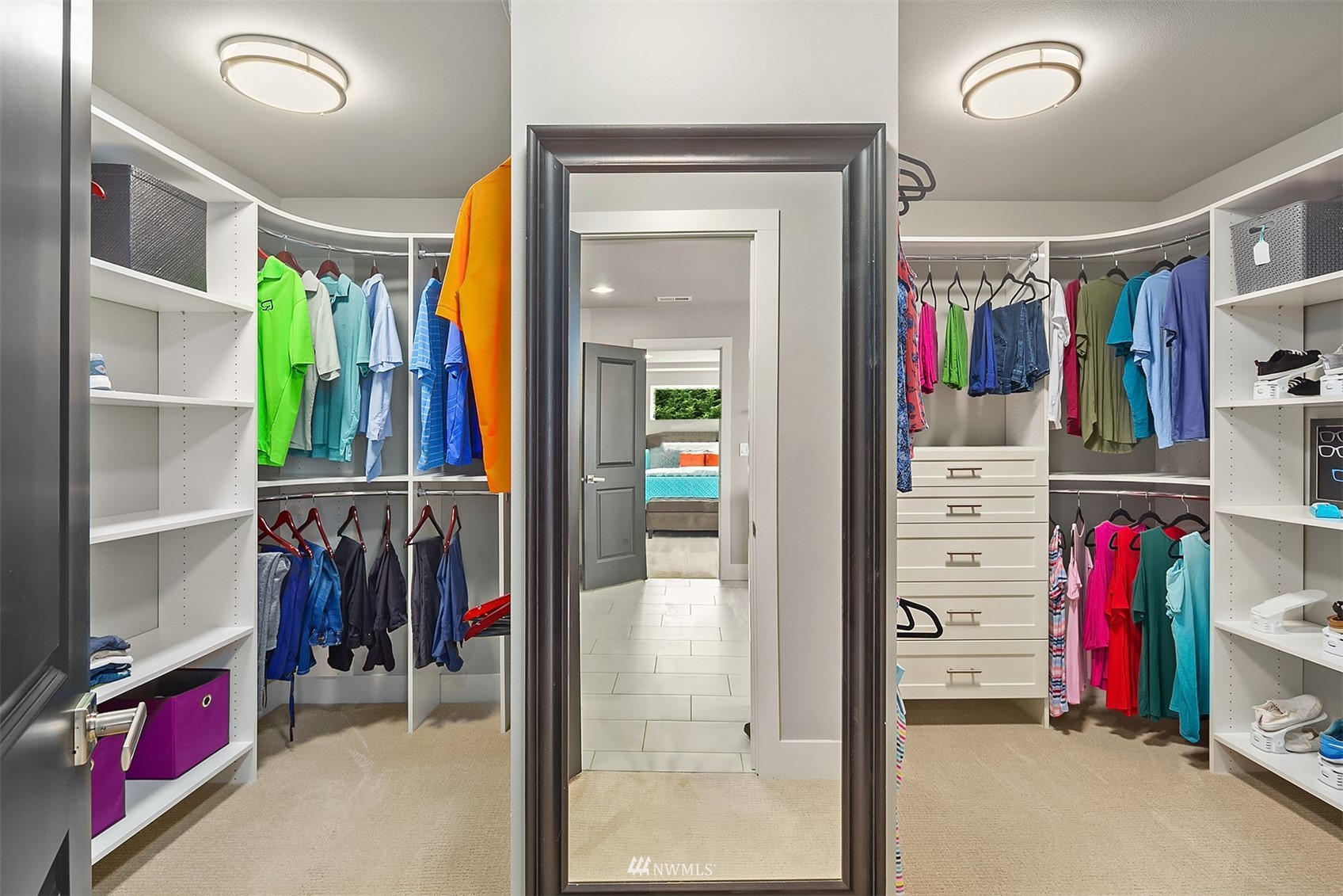 20611 37th Avenue Southeast Bothell, WA 98021 - Photo 34 of 40 a view of walk in closet with clothes and shoes