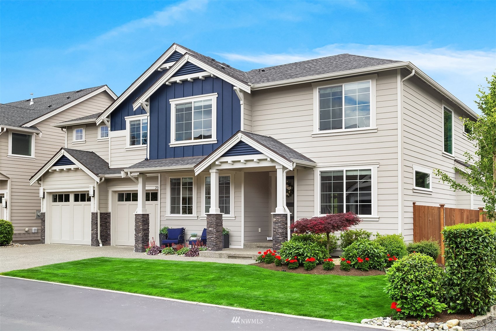 20611 37th Avenue Southeast Bothell, WA 98021 - Photo 40 of 40 a front view of a house with a garden and plants