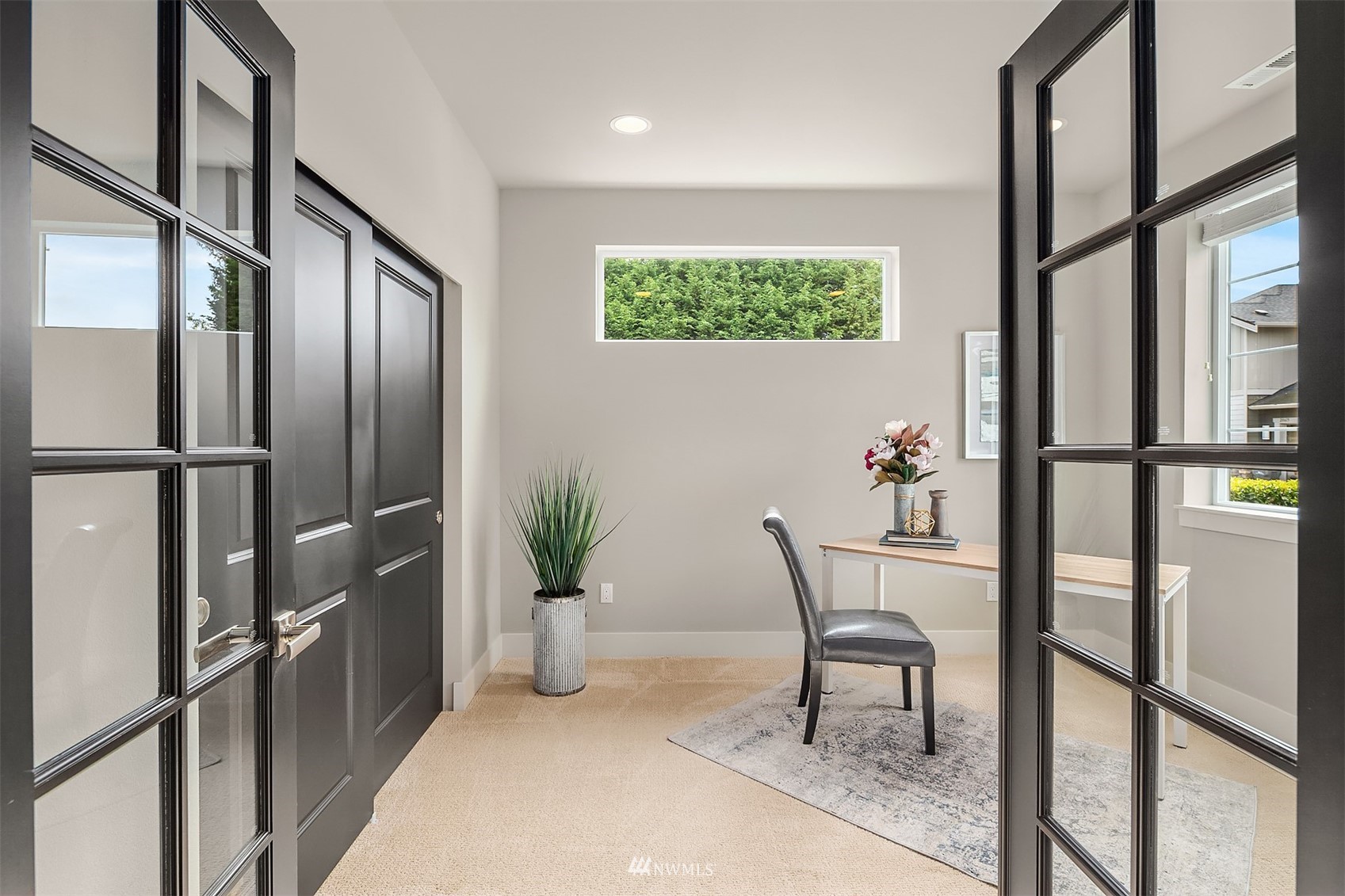 20611 37th Avenue Southeast Bothell, WA 98021 - Photo 4 of 40 a view of a hallway with furniture and front door