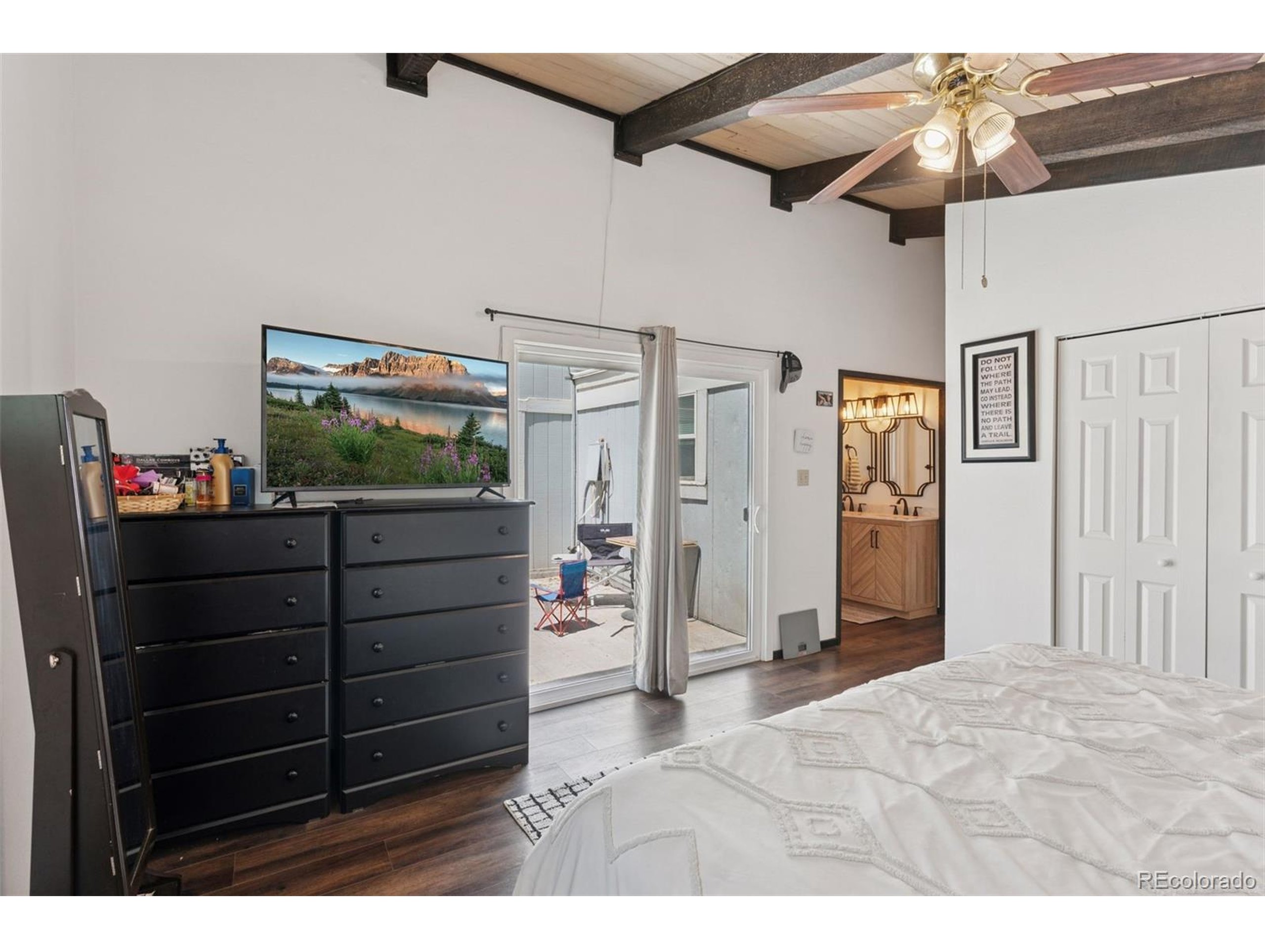 16880 Old Pueblo Road Fountain, CO 80817 - Photo 13 of 49 a living room with furniture and a flat screen tv