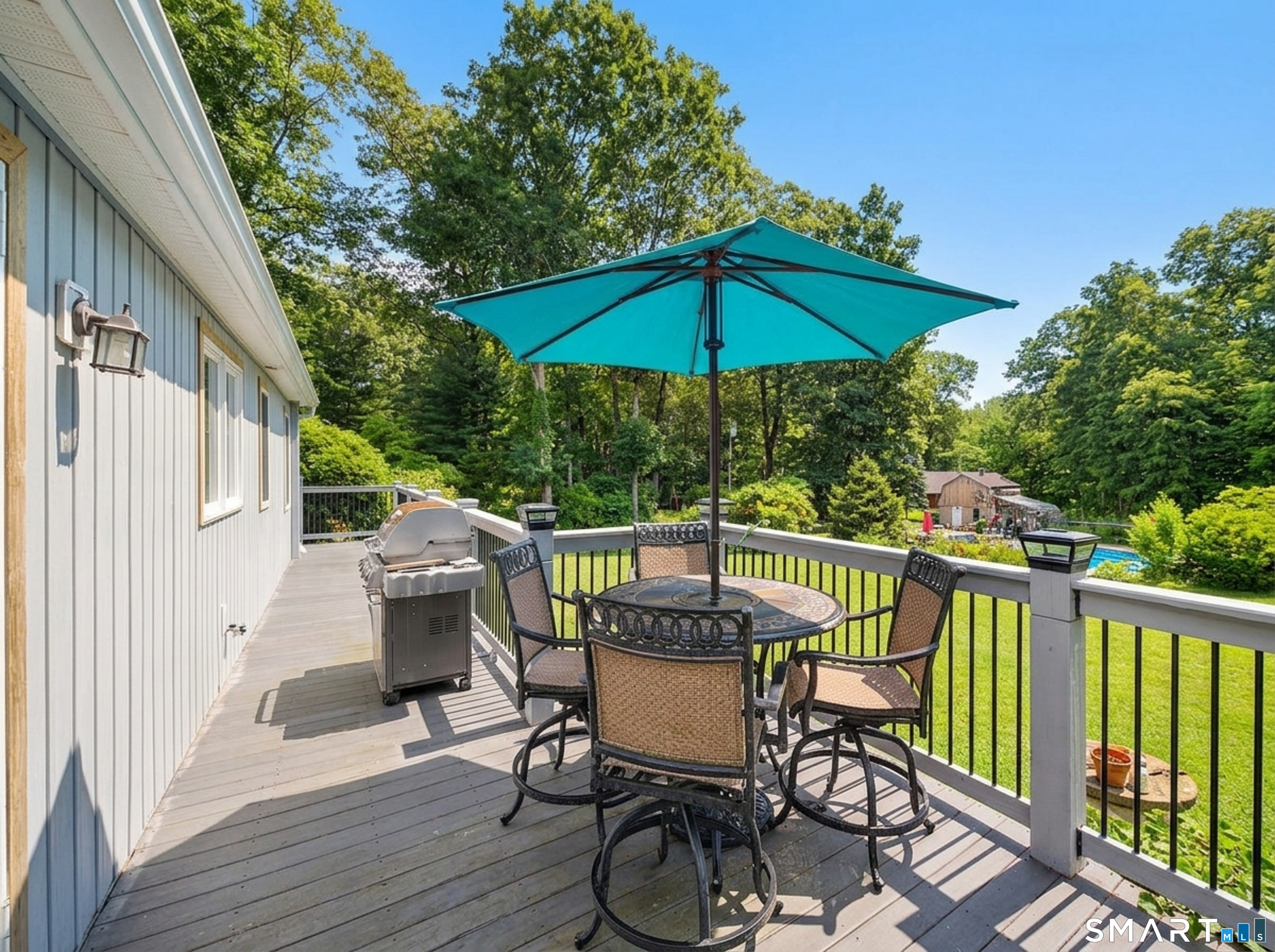 170 Dennison Road Westbrook, CT 06498 - Photo 30 of 40 Deck overlooking beautiful yard and pool