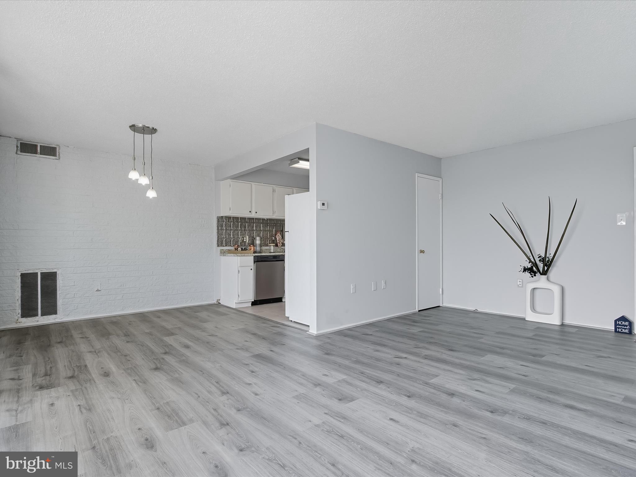 1828 Metzerott Road, Unit 408 Adelphi, MD 20783 - Photo 7 of 26 Living and Dining Areas