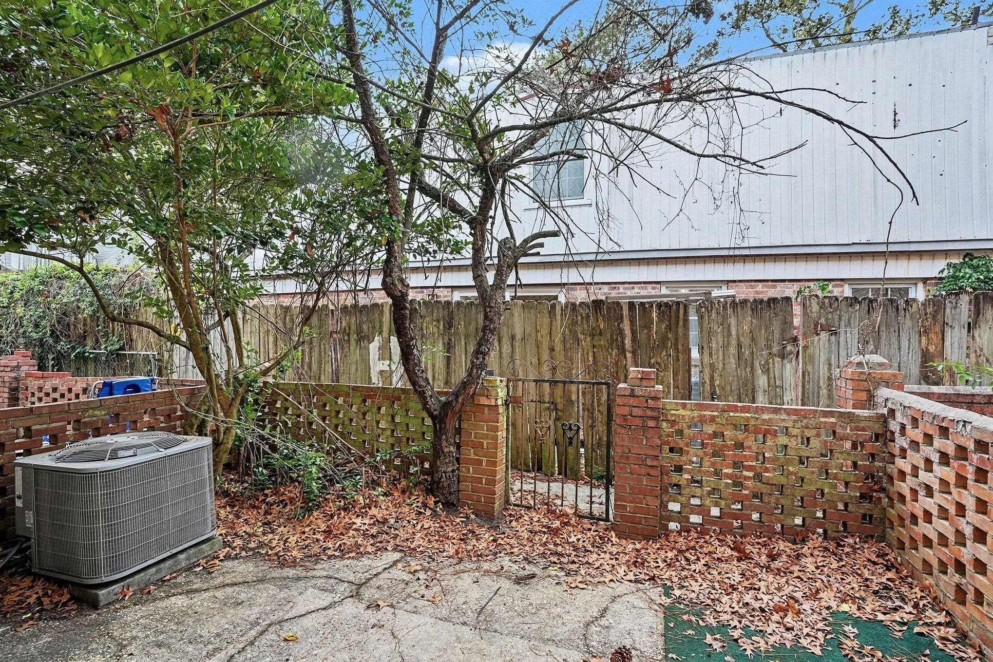 513 65th Avenue North, Unit I Myrtle Beach, SC 29572 - Photo 18 of 21 View of patio with a fence