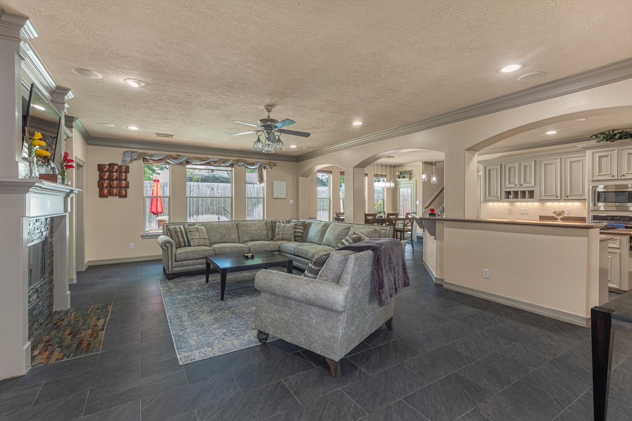 18422 Bivens Bend Spring, TX 77379 - Photo 19 of 50 a living room with lots of furniture and kitchen view