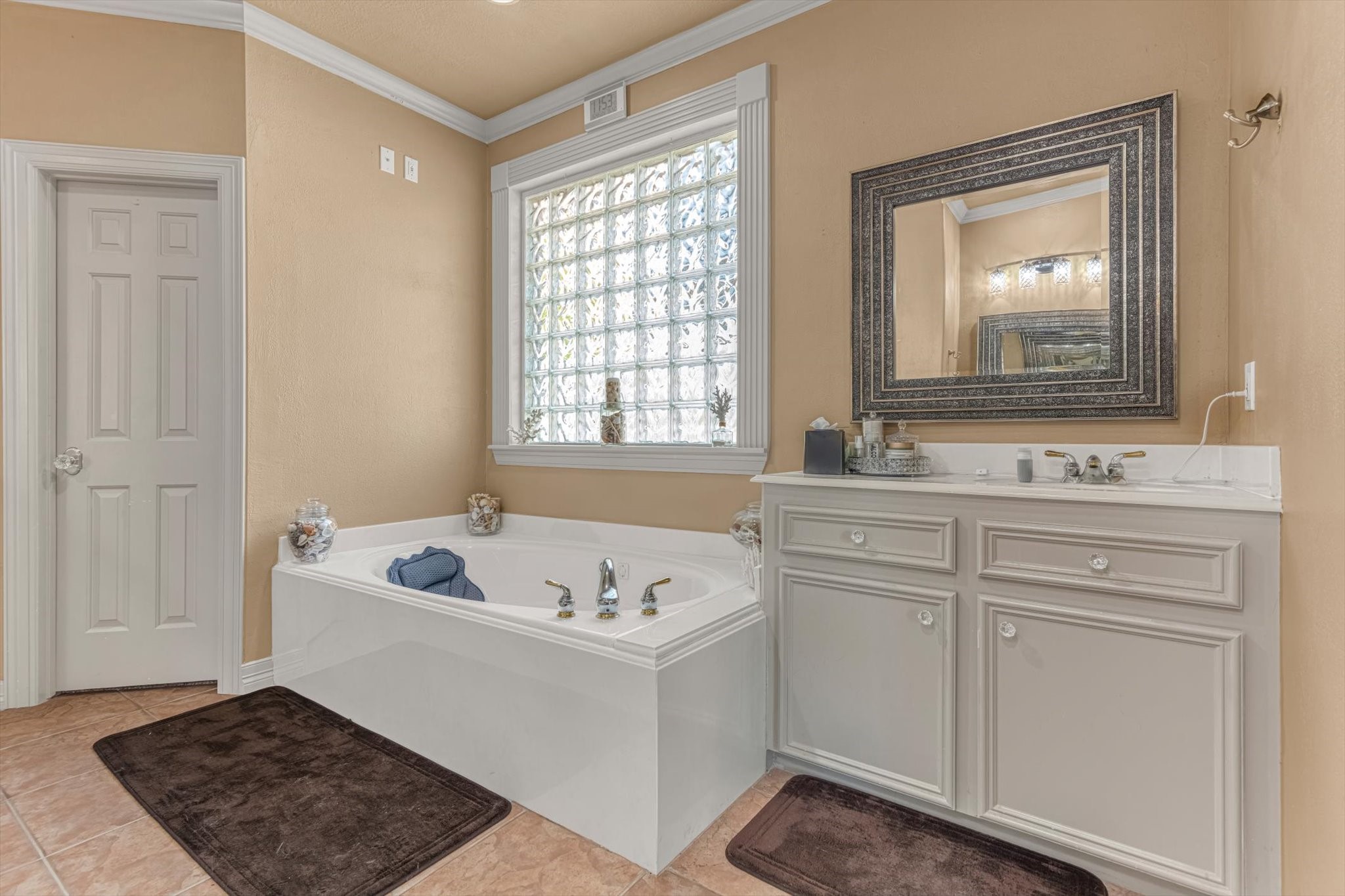 18422 Bivens Bend Spring, TX 77379 - Photo 23 of 50 a bathroom with a sink and a bathtub