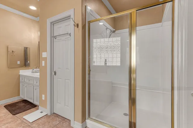 a bathroom with a tub sink and a mirror