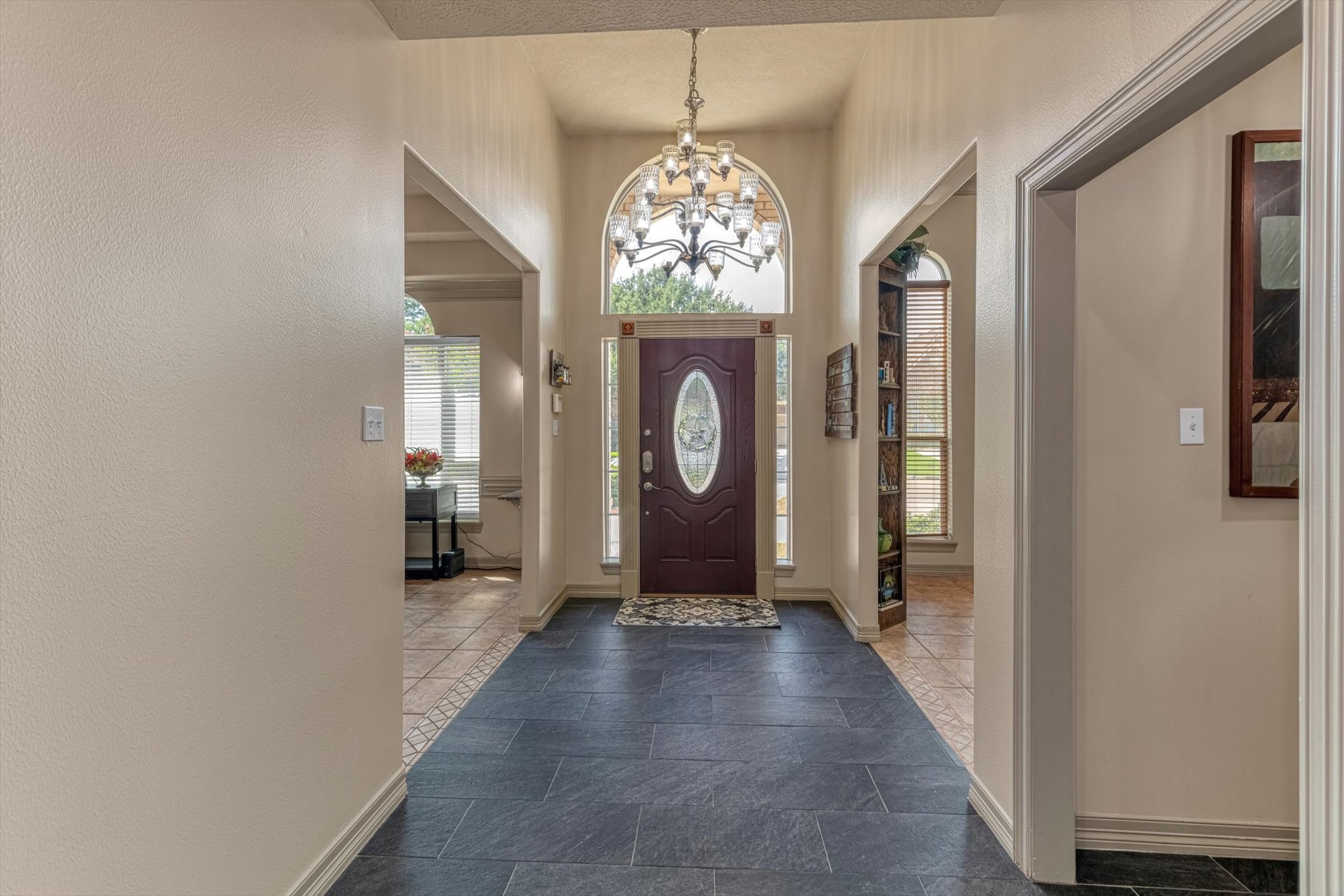 18422 Bivens Bend Spring, TX 77379 - Photo 4 of 50 a view of a hallway with windows chandelier
